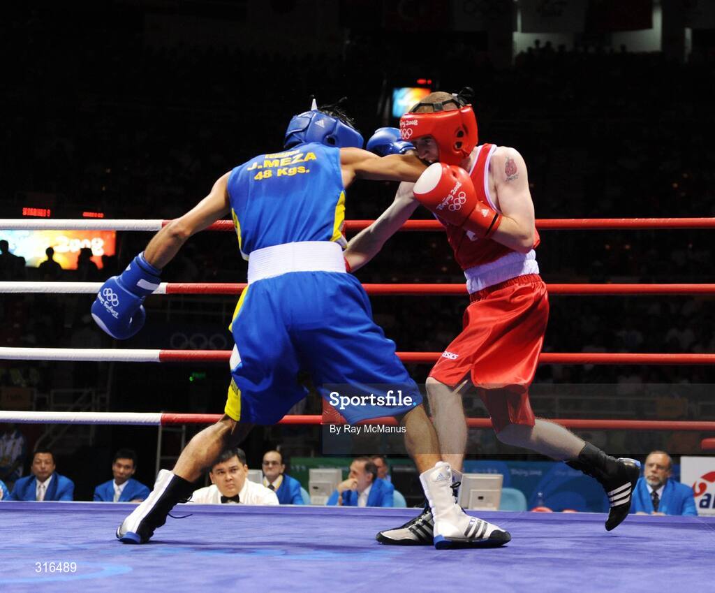 16 August 2008; Paddy Barnes, Ireland, in action against Jose Luis Meza, from Ecuador, during the 'round of 16' Light Fly weight, 48kg, contest. Beijing 2008 - Games of the XXIX Olympiad, Beijing Workers Gymnasium, Olympic Green, Beijing, China. Picture credit: Ray McManus / SPORTSFILE