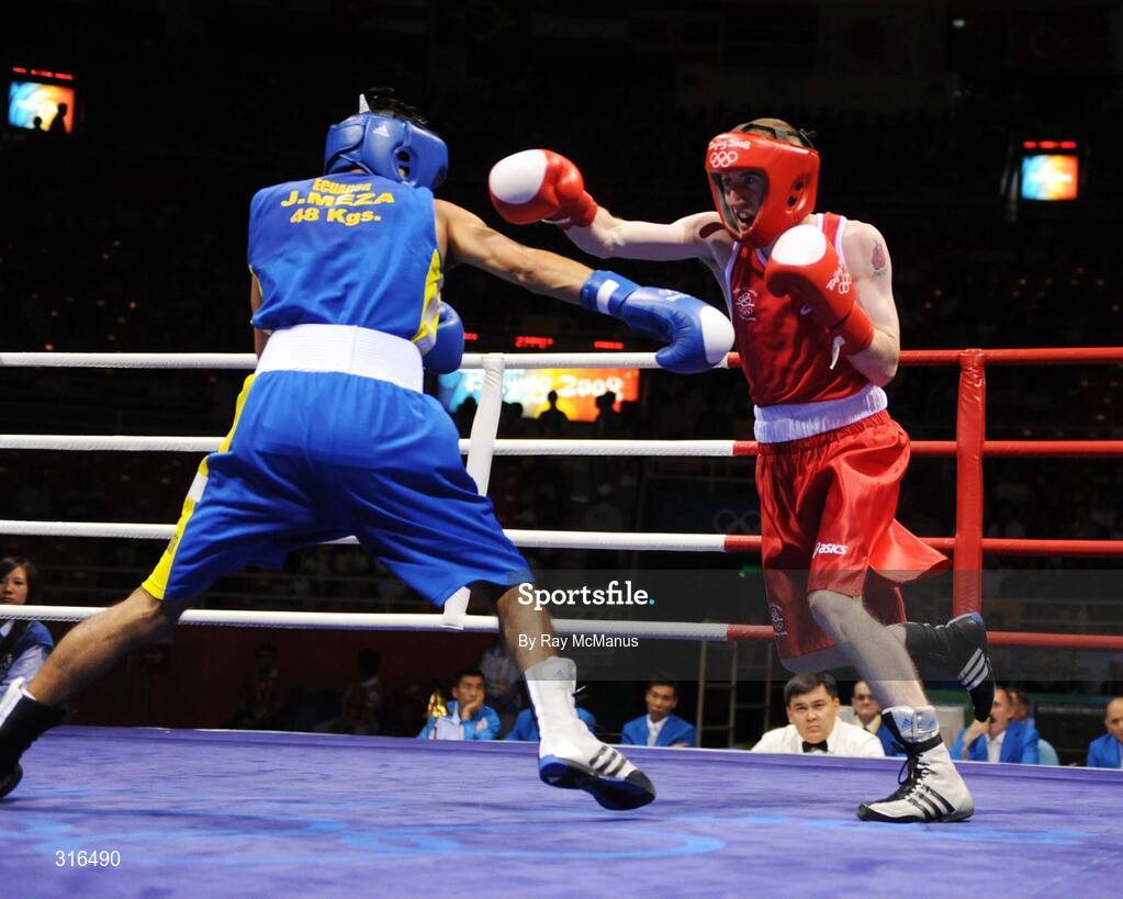 16 August 2008; Paddy Barnes, Ireland, in action against Jose Luis Meza, from Ecuador, during the 'round of 16' Light Fly weight, 48kg, contest. Beijing 2008 - Games of the XXIX Olympiad, Beijing Workers Gymnasium, Olympic Green, Beijing, China. Picture credit: Ray McManus / SPORTSFILE