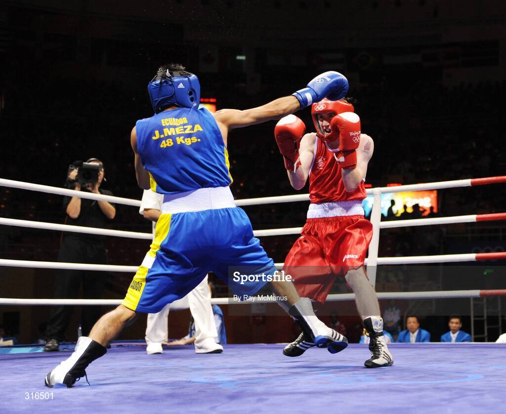 16 August 2008; Paddy Barnes, Ireland, in action against Jose Luis Meza, from Ecuador, during the 'round of 16' Light Fly weight, 48kg, contest. Beijing 2008 - Games of the XXIX Olympiad, Beijing Workers Gymnasium, Olympic Green, Beijing, China. Picture credit: Ray McManus / SPORTSFILE