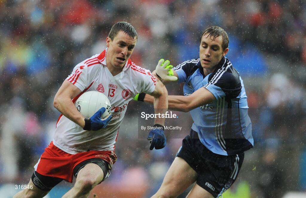 16 August 2008; Tommy McGuigan, Tyrone, in action against Paul Griffin, Dublin. GAA Football All-Ireland Senior Championship Quarter-Final, Dublin v Tyrone, Croke Park, Dublin. Picture credit: Stephen McCarthy / SPORTSFILE