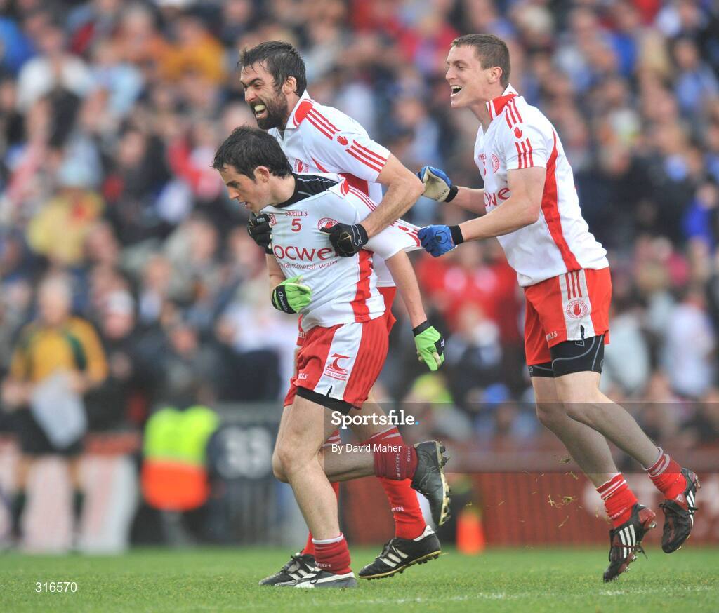 16 August 2008; Tyrone's Davy Harte, left, celebrates after scoring his side's third goal with team-mates Joseph McMahon, centre, and Tommy McGuigan. GAA Football All-Ireland Senior Championship Quarter-Final, Dublin v Tyrone, Croke Park, Dublin. Picture credit: David Maher / SPORTSFILE