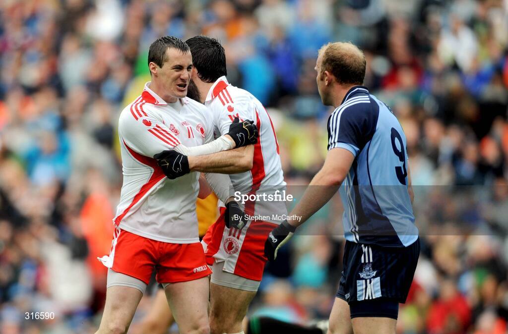 16 August 2008; Brian McGuigan, Tyrone, congratulates Joseph McMahon after scoring his side's second goal as Shane Ryan, Dublin, looks on. GAA Football All-Ireland Senior Championship Quarter-Final, Dublin v Tyrone, Croke Park, Dublin. Picture credit: Stephen McCarthy / SPORTSFILE