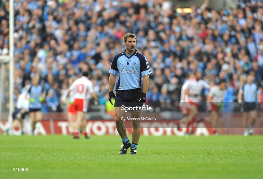 16 August 2008; A dejected Bryan Cullen, Dublin, looks on as Tyrone players celebrate after Davy Harte scored his side's thrid goal. GAA Football All-Ireland Senior Championship Quarter-Final, Dublin v Tyrone, Croke Park, Dublin. Picture credit: Stephen McCarthy / SPORTSFILE