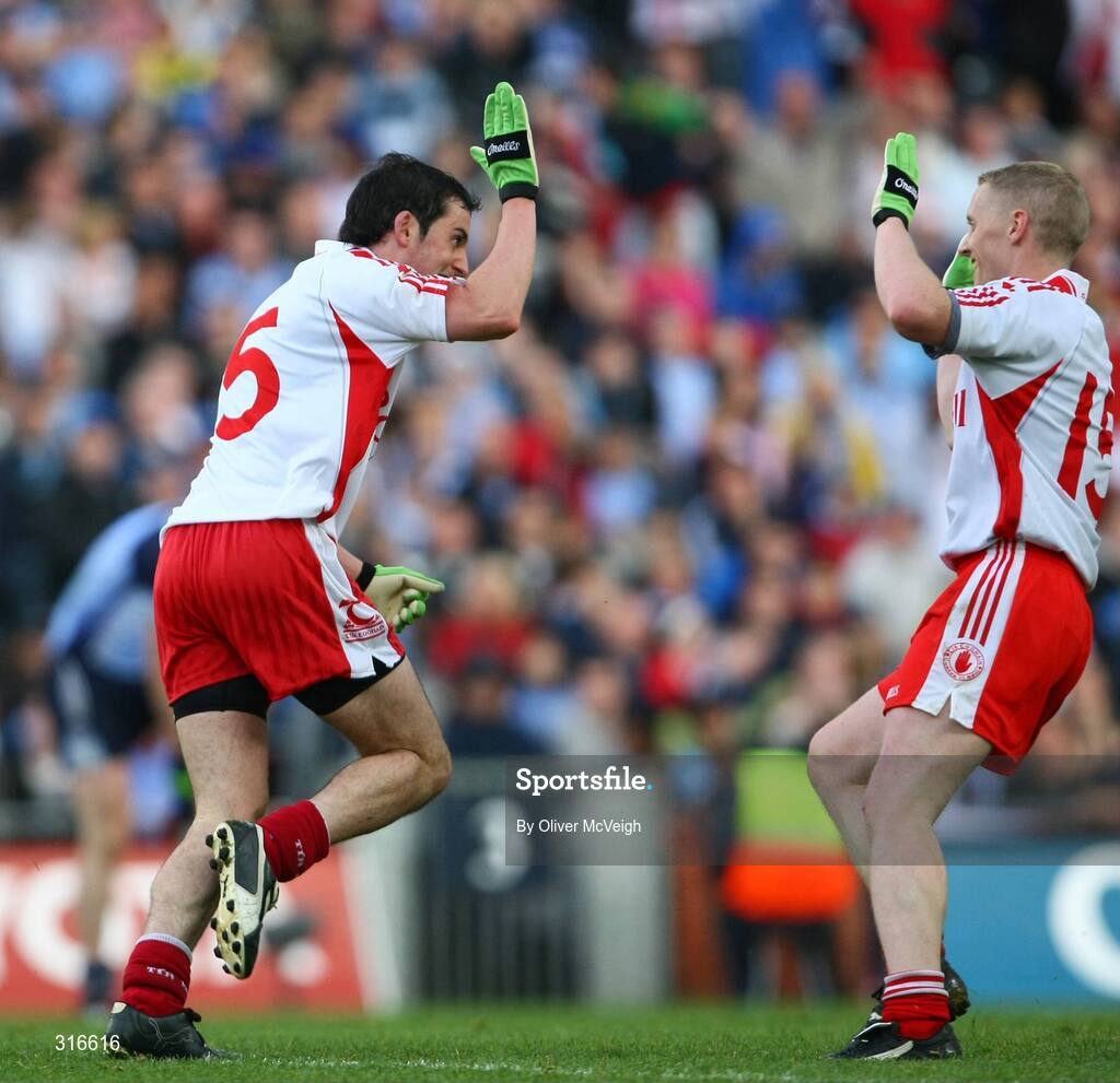 16 August 2008; Tyrone's Davy Harte turns to celebrate with team-mate Colm McCullagh after scoring his side's third goal. GAA Football All-Ireland Senior C'ship Quarter-Final, Dublin v Tyrone, Croke Park, Dublin. Picture credit: Oliver McVeigh / SPORTSFILE