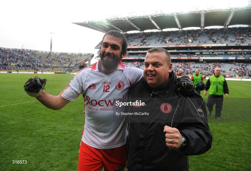 16 August 2008; Tyrone's Joseph McMahon celebrates with team trainer Fergal McCann after the match. GAA Football All-Ireland Senior Champoinship Quarter-Final, Dublin v Tyrone, Croke Park, Dublin. Picture credit: Stephen McCarthy / SPORTSFILE *** Local Caption *** Fergal McCann