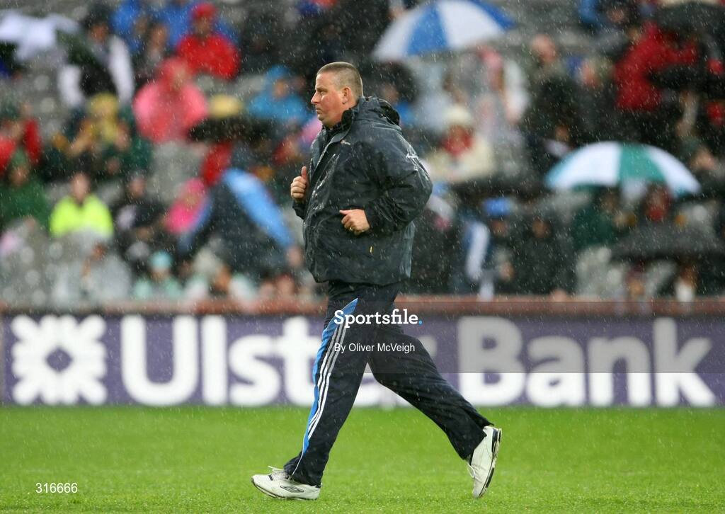 16 August 2008; Dublin manager Paul Caffrey jogs off the field at the end of the match. GAA Football All-Ireland Senior Championship Quarter-Final, Dublin v Tyrone, Croke Park, Dublin. Picture credit: Oliver McVeigh / SPORTSFILE