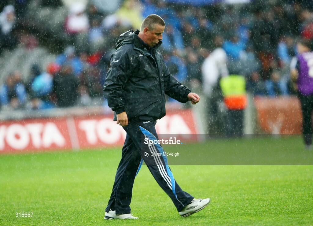 16 August 2008; Dublin manager Paul Caffrey walks off the field at the end of the match. GAA Football All-Ireland Senior Championship Quarter-Final, Dublin v Tyrone, Croke Park, Dublin. Picture credit: Oliver McVeigh / SPORTSFILE