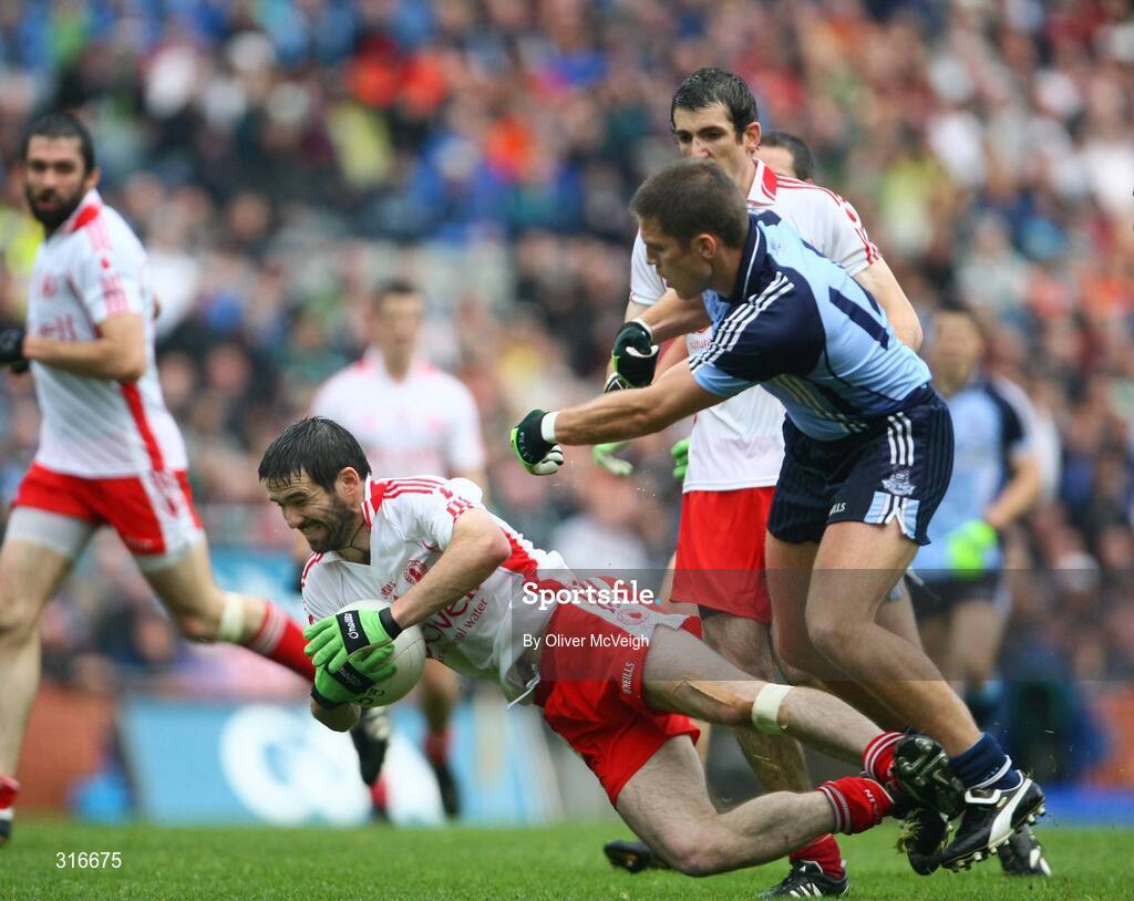 16 August 2008; Ciaran Gourley, Tyrone, in action against Jason Sherlock, Dublin. GAA Football All-Ireland Senior Championship Quarter-Final, Dublin v Tyrone, Croke Park, Dublin. Picture credit: Oliver McVeigh / SPORTSFILE