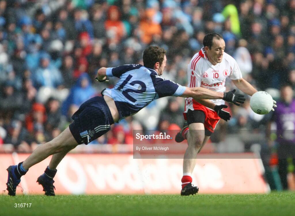 16 August 2008; Brian Dooher, Tyrone, in action against Kevin Bonner, Dublin. GAA Football All-Ireland Senior Championship Quarter-Final, Dublin v Tyrone, Croke Park, Dublin. Picture credit: Oliver McVeigh / SPORTSFILE