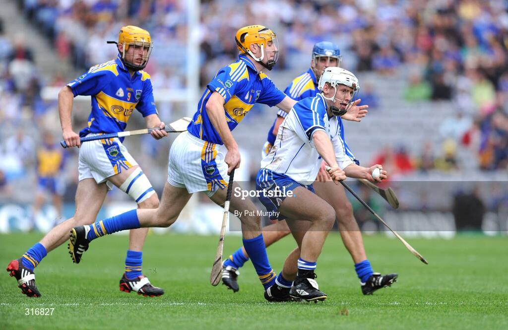 17 August 2008; Stephen Molumphy, Waterford, in action against Tipperary's, from left, Shane McGrath, Seamus Callinan and Hugh Maloney. GAA Hurling All-Ireland Senior Championship Semi-Final, Tipperary v Waterford, Croke Park, Dublin. Picture credit: Pat Murphy / SPORTSFILE