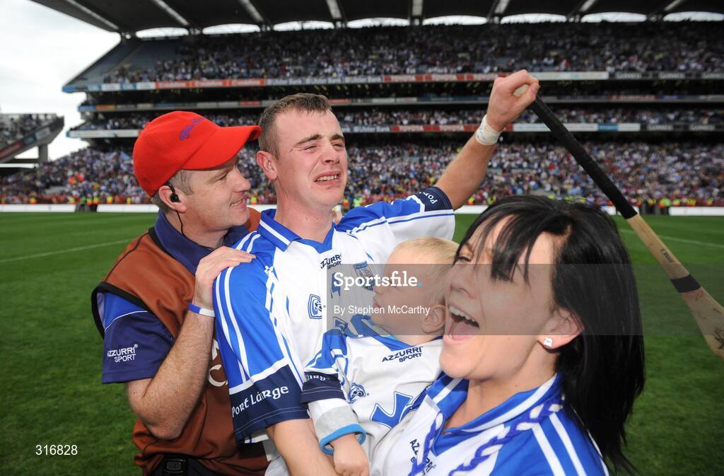 17 August 2008; Waterford's Eoin Kelly celebrates with his girlfriend Sharon Carey, son Sean, age 2, and John Carey, left, after the match. GAA Hurling All-Ireland Senior Championship Semi-Final, Tipperary v Waterford, Croke Park, Dublin. Picture credit: Stephen McCarthy / SPORTSFILE *** Local Caption *** john carey