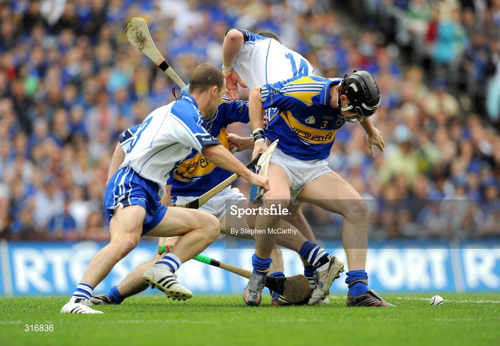 17 August 2008; Paul Curran, left, and Conor O'Brien, Tipperary, in action against Eoin McGrath, left, and Eoin Kelly, Waterford. GAA Hurling All-Ireland Senior Championship Semi-Final, Tipperary v Waterford, Croke Park, Dublin. Picture credit: Stephen McCarthy / SPORTSFILE