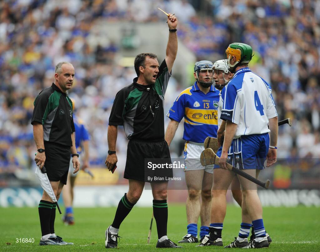 17 August 2008; Referee Diarmuid Kirwan issues Waterford's Aidan Kearney with a yellow card. GAA Hurling All-Ireland Senior Championship Semi-Final, Tipperary v Waterford, Croke Park, Dublin. Picture credit: Brian Lawless / SPORTSFILE