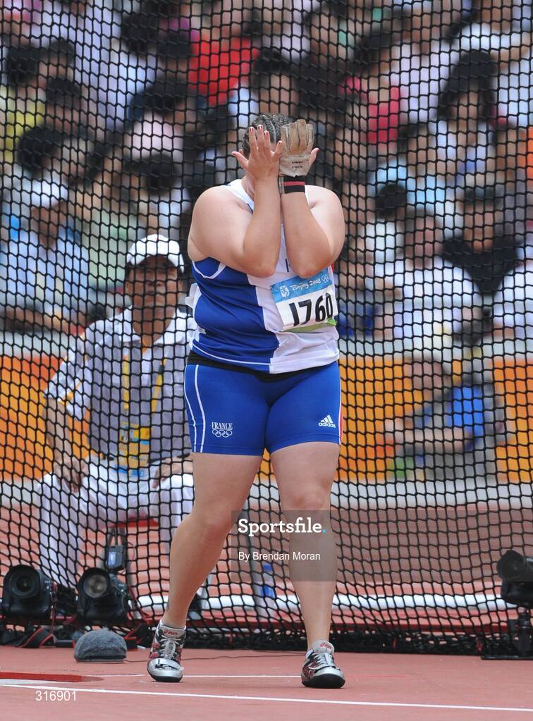 18 August 2008; Amelie Perrin, of France, reacts after her third attempt in Group B of the Women's Hammer Qualifying. She failed to with all three throws achieving no mark. Beijing 2008 - Games of the XXIX Olympiad, National Stadium, Olympic Green, Beijing, China. Picture credit: Brendan Moran / SPORTSFILE