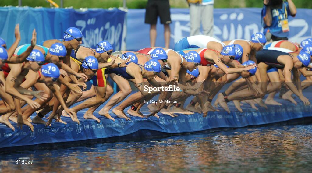 18 August 2008; Ireland's Emma Davis, centre wearing 53, and the field at the start of the Women's Triathlon. Davis completed the course in a time of 2:06:29.36. Beijing 2008 - Games of the XXIX Olympiad, Triathlon Venue, Ming Tomb Reservoir, Beijing, China. Picture credit: Ray McManus / SPORTSFILE