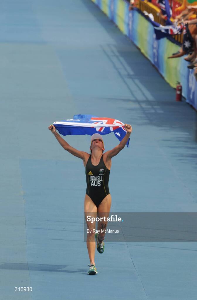 18 August 2008; Emma Snowsill, Australia, crosses the line to win the Women's Triathlon in a time of 1:58:27.66. Beijing 2008 - Games of the XXIX Olympiad, Triathlon Venue, Ming Tomb Reservoir, Beijing, China. Picture credit: Ray McManus / SPORTSFILE