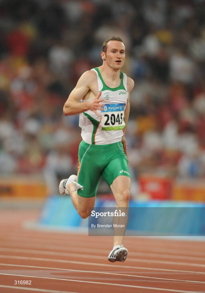 18 August 2008; Paul Hession, Ireland, on his way to winning his Round 2 heat of the Men's 200m in a season best time of 20.32 and qualifying for the semi-finals. Beijing 2008 - Games of the XXIX Olympiad, National Stadium, Olympic Green, Beijing, China. Picture credit: Brendan Moran / SPORTSFILE