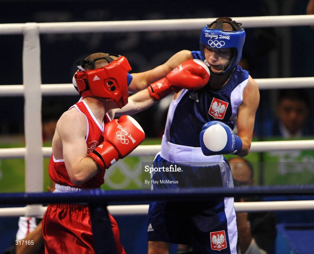 19 August 2008; Paddy Barnes, Ireland, in action against Lukasz Maszczyk, in blue from Poland, during their quarter-final bout of the Light Fly weight, 48kg, contest. Beijing 2008 - Games of the XXIX Olympiad, Beijing Workers Gymnasium, Olympic Green, Beijing, China. Picture credit: Ray McManus / SPORTSFILE