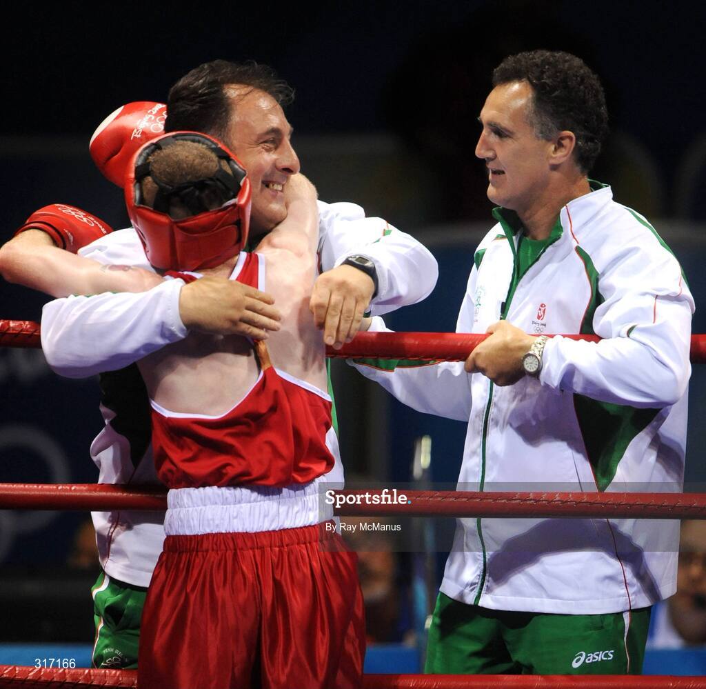 19 August 2008; Ireland's Paddy Barnes celebrates victory, in the quarter-final bout of the Light Fly weight, 48kg, contest, over Lukasz Maszczyk, from Poland, with technical coach Zaur Antia and head coach Billy Walsh. Beijing 2008 - Games of the XXIX Olympiad, Beijing Workers Gymnasium, Olympic Green, Beijing, China. Picture credit: Ray McManus / SPORTSFILE