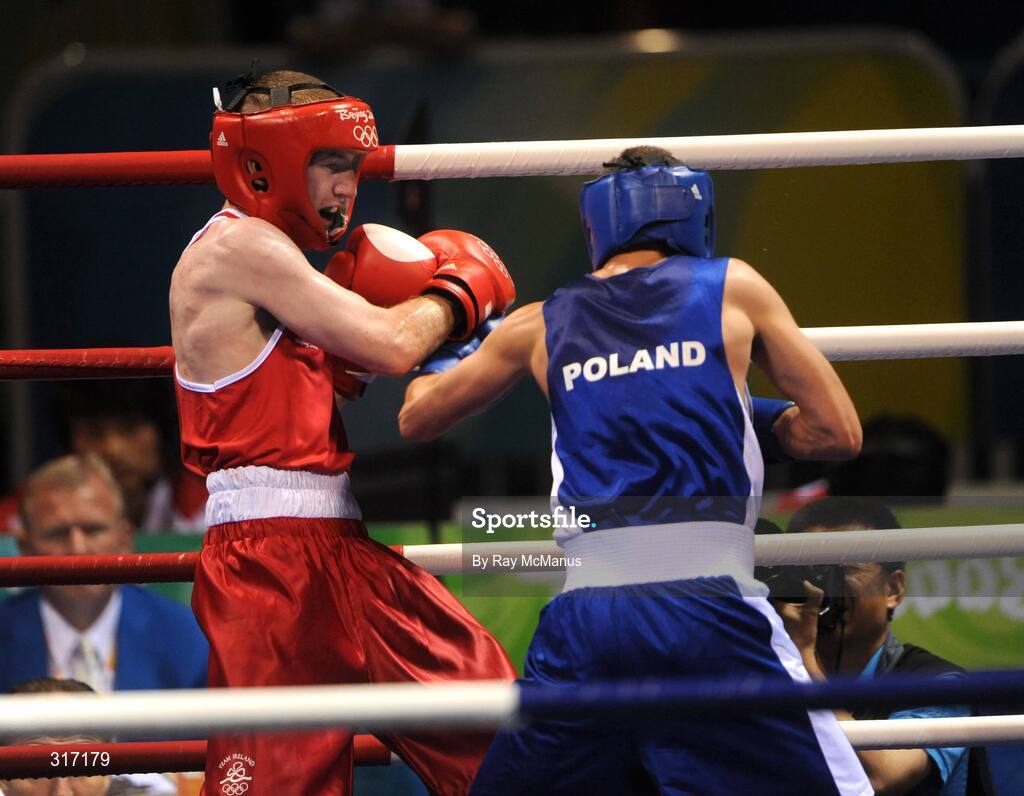 19 August 2008; Paddy Barnes, Ireland, in action against Lukasz Maszczyk, in blue from Poland, during their quarter-final bout of the Light Fly weight, 48kg, contest. Beijing 2008 - Games of the XXIX Olympiad, Beijing Workers Gymnasium, Olympic Green, Beijing, China. Picture credit: Ray McManus / SPORTSFILE