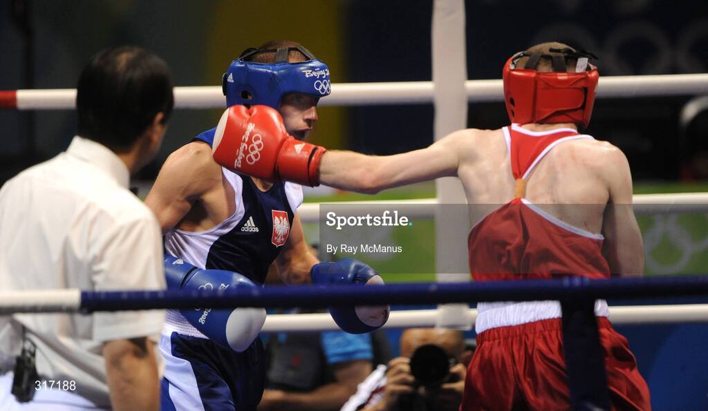 19 August 2008; Paddy Barnes, Ireland, in action against Lukasz Maszczyk, in blue from Poland, during their quarter-final bout of the Light Fly weight, 48kg, contest. Beijing 2008 - Games of the XXIX Olympiad, Beijing Workers Gymnasium, Olympic Green, Beijing, China. Picture credit: Ray McManus / SPORTSFILE