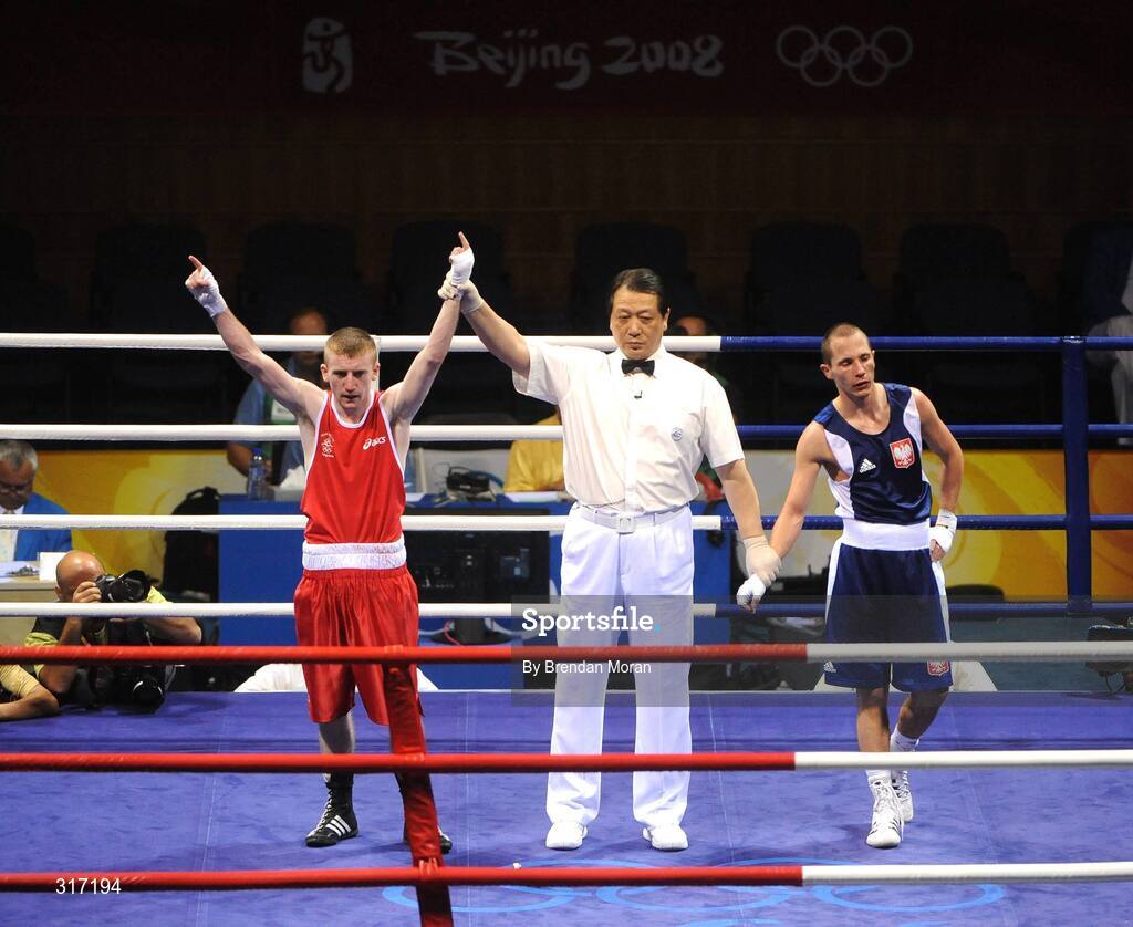 19 August 2008; Paddy Barnes, Ireland, celebrates his victory over Lukasz Maszczyk, Poland, after their quarter-final bout in the Light Fly weight, 48kg, contest. Beijing 2008 - Games of the XXIX Olympiad, Beijing Workers' Gymnasium, Olympic Green, Beijing, China. Picture credit: Brendan Moran / SPORTSFILE