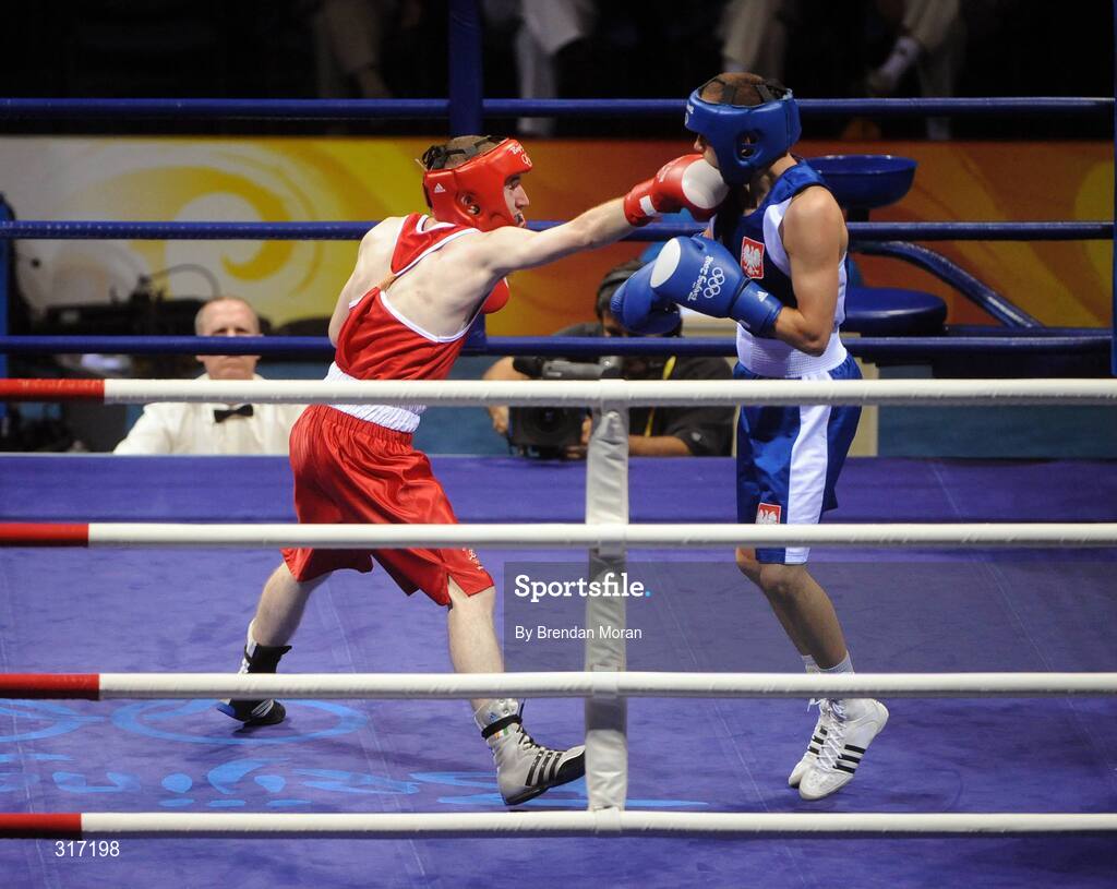 19 August 2008; Paddy Barnes, Ireland, in action against Lukasz Maszczyk, in blue, Poland, during their quarter-final bout in the Light Fly weight, 48kg, contest. Beijing 2008 - Games of the XXIX Olympiad, Beijing Workers' Gymnasium, Olympic Green, Beijing, China. Picture credit: Brendan Moran / SPORTSFILE
