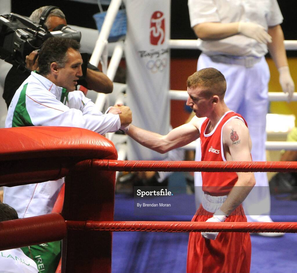 19 August 2008; Paddy Barnes, Ireland, is congratulated by coach Billy Walsh after his victory over Lukasz Maszczyk, Poland, after their quarter-final bout in the Light Fly weight, 48kg, contest. Beijing 2008 - Games of the XXIX Olympiad, Beijing Workers' Gymnasium, Olympic Green, Beijing, China. Picture credit: Brendan Moran / SPORTSFILE