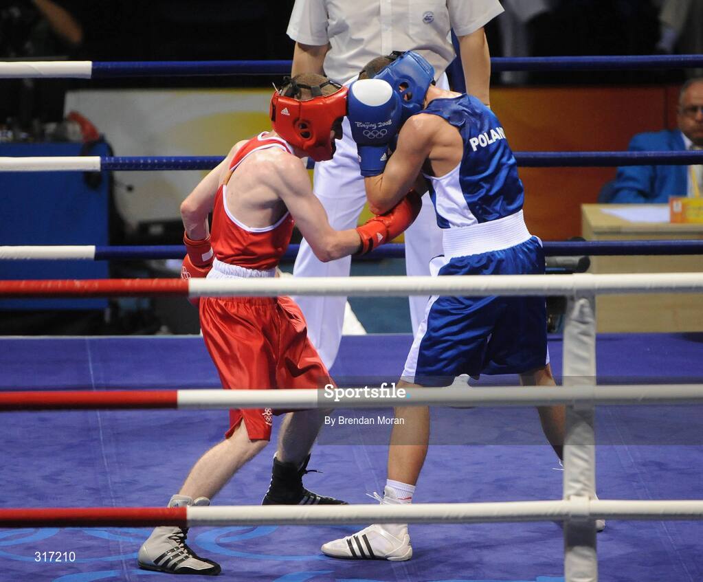 19 August 2008; Paddy Barnes, Ireland, in action against Lukasz Maszczyk, in blue, Poland, during round 3 of their quarter-final bout in the Light Fly weight, 48kg, contest. Beijing 2008 - Games of the XXIX Olympiad, Beijing Workers' Gymnasium, Olympic Green, Beijing, China. Picture credit: Brendan Moran / SPORTSFILE
