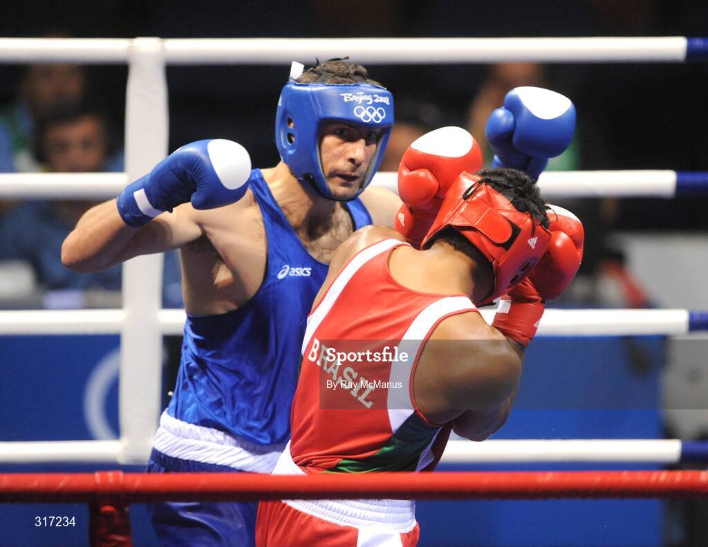 19 August 2008; Kenny Egan, Ireland, in action against Washington Silva, in red from Brazil, during their quarter-final bout of the Light Heavy weight, 81kg, contest. Beijing 2008 - Games of the XXIX Olympiad, Beijing Workers Gymnasium, Olympic Green, Beijing, China. Picture credit: Ray McManus / SPORTSFILE