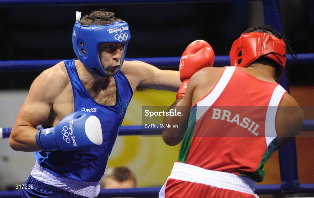 19 August 2008; Kenny Egan, Ireland, in action against Washington Silva, in red from Brazil, during their quarter-final bout of the Light Heavy weight, 81kg, contest. Beijing 2008 - Games of the XXIX Olympiad, Beijing Workers Gymnasium, Olympic Green, Beijing, China. Picture credit: Ray McManus / SPORTSFILE