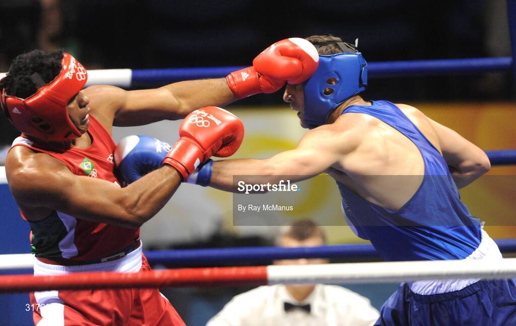 19 August 2008; Kenny Egan, Ireland, scores his third point against Washington Silva, in red from Brazil, during their quarter-final bout of the Light Heavy weight, 81kg, contest. Beijing 2008 - Games of the XXIX Olympiad, Beijing Workers Gymnasium, Olympic Green, Beijing, China. Picture credit: Ray McManus / SPORTSFILE