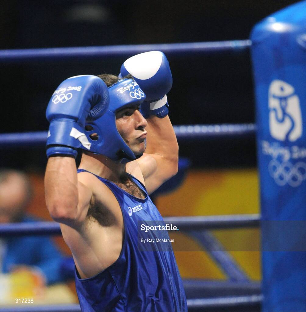 19 August 2008; Kenny Egan, Ireland, celebrates victory over Washington Silva, from Brazil, after their quarter-final bout of the Light Heavy weight, 81kg, contest. Beijing 2008 - Games of the XXIX Olympiad, Beijing Workers Gymnasium, Olympic Green, Beijing, China. Picture credit: Ray McManus / SPORTSFILE