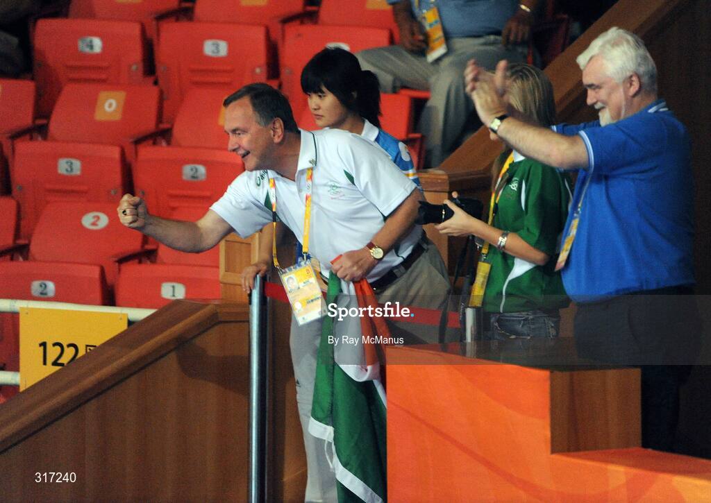 19 August 2008; Martin Cullen, T.D., Minister for Arts, Sport and Tourism celebrates after Paddy Barnes, Ireland, defeated Lukasz Maszczyk, Poland, in their quarter-final bout of the Light Fly weight, 48kg, contest. Beijing 2008 - Games of the XXIX Olympiad, Beijing Workers Gymnasium, Olympic Green, Beijing, China. Picture credit: Ray McManus / SPORTSFILE