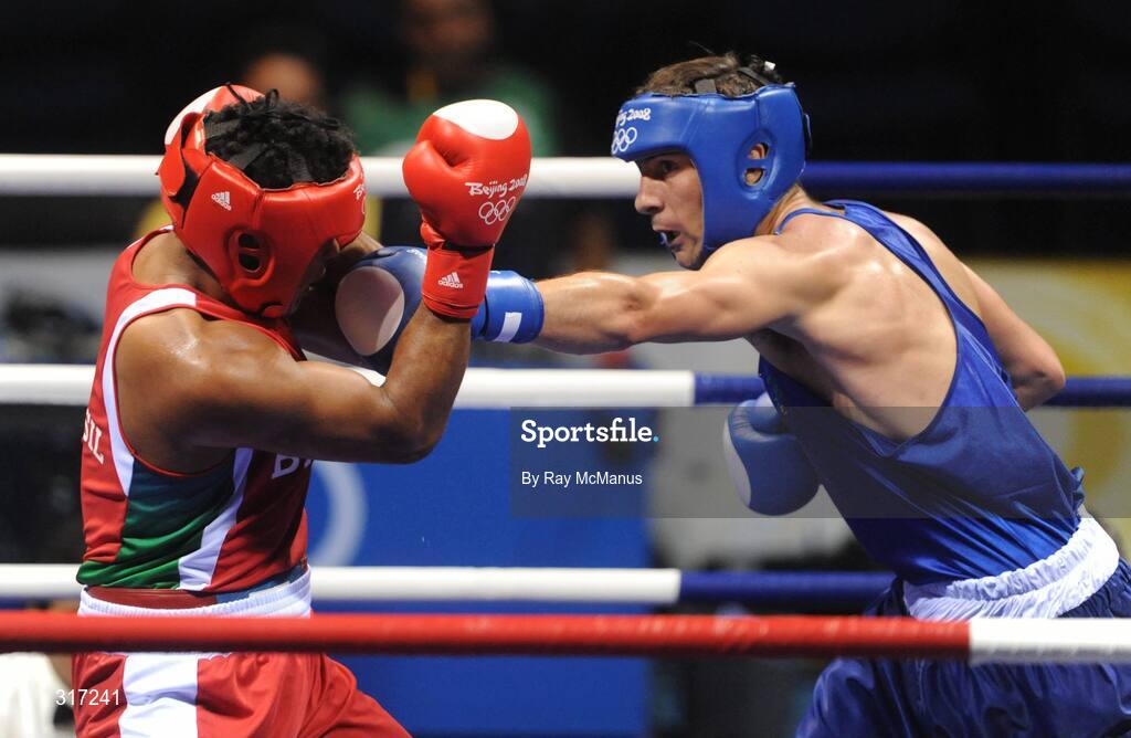 19 August 2008; Kenny Egan, Ireland, in action against Washington Silva, in red from Brazil, during their quarter-final bout of the Light Heavy weight, 81kg, contest. Beijing 2008 - Games of the XXIX Olympiad, Beijing Workers Gymnasium, Olympic Green, Beijing, China. Picture credit: Ray McManus / SPORTSFILE