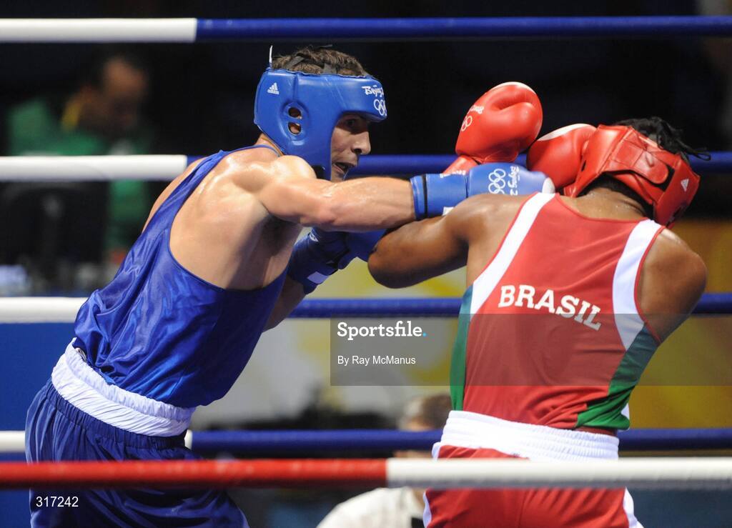 19 August 2008; Kenny Egan, Ireland, in action against Washington Silva, in red from Brazil, during their quarter-final bout of the Light Heavy weight, 81kg, contest. Beijing 2008 - Games of the XXIX Olympiad, Beijing Workers Gymnasium, Olympic Green, Beijing, China. Picture credit: Ray McManus / SPORTSFILE