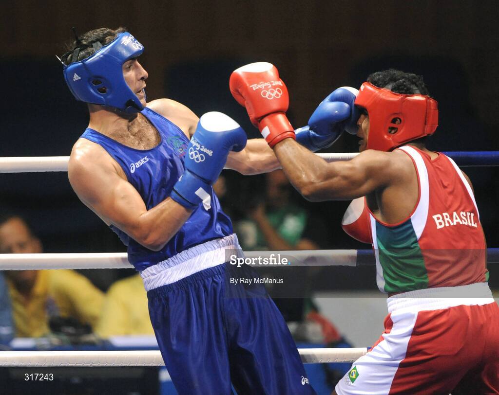 19 August 2008; Kenny Egan, Ireland, in action against Washington Silva, in red from Brazil, during their quarter-final bout of the Light Heavy weight, 81kg, contest. Beijing 2008 - Games of the XXIX Olympiad, Beijing Workers Gymnasium, Olympic Green, Beijing, China. Picture credit: Ray McManus / SPORTSFILE