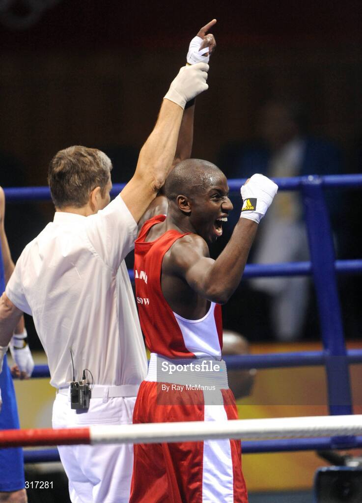 19 August 2008; Daouda Sow, France, celebrates his victory over Qing Hu, from China, after their quarter-final bout of the Light weight, 60kg, contest. Beijing 2008 - Games of the XXIX Olympiad, Beijing Workers Gymnasium, Olympic Green, Beijing, China. Picture credit: Ray McManus / SPORTSFILE