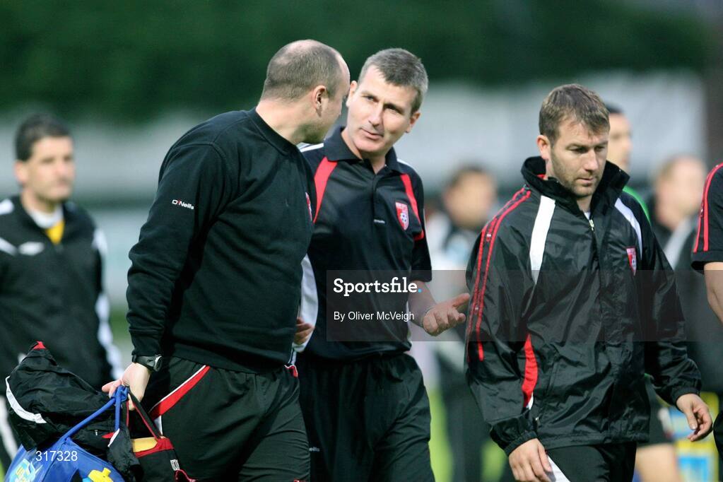 19 August 2008; Derry City manager Stephen Kenny, centre, leaves the field at half-time in conversation with coach Colm O'Neill. FAI Ford Cup Fourth Round, Derry City v Kildare County, Brandywell, Derry. Picture credit: Oliver McVeigh / SPORTSFILE