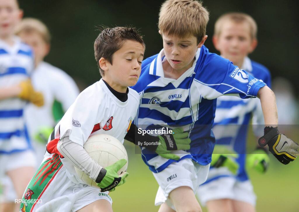 17 August 2008; The HSE Community Games National Finals kicked off in style this weekend as the Games celebrate 40 years of fun and achievement. Pictured at the HSE Community Games National Finals in Mosney is Sean Kerr, Ternonmaccuirt, Co. Tyrone, left, in action against Sean Cullen, Naas West, Co. Kildare in the Mixed Under 10 Gaelic Football Final. This years finals, which will take place from 16th - 17th August and 23rd - 24th August, will see an estimated 6,500 young people aged between six and 16 years participate in a diverse range of activities such as athletics, football, basketball, art, model making and dancing. Photo by Sportsfile