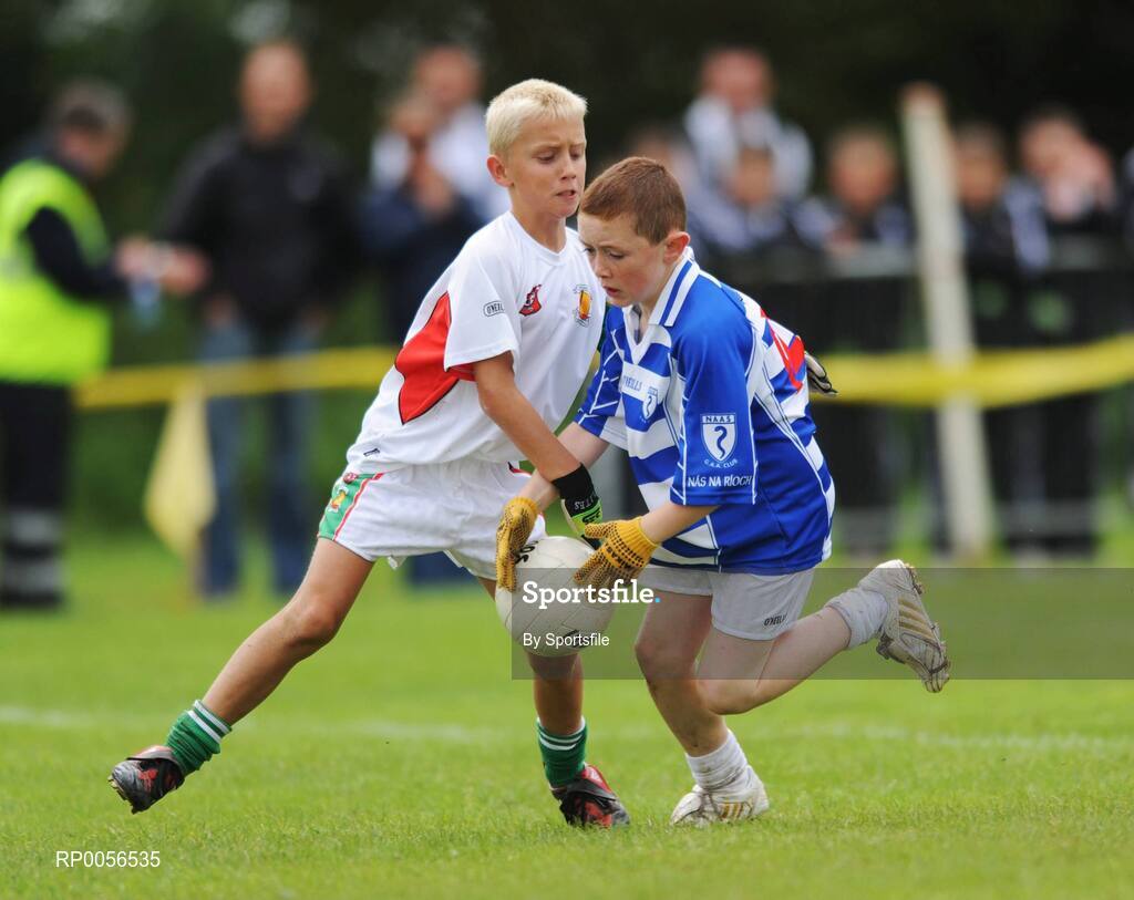 17 August 2008; The HSE Community Games National Finals kicked off in style this weekend as the Games celebrate 40 years of fun and achievement. Pictured at the HSE Community Games National Finals in Mosney is Sam Garvey, right, Naas West, Co. Kildare, in action against Conor Loughran, Ternonmaccuirrt, Co. Tyrone in the Mixed Under 10 Gaelic Football Final. This years finals, which will take place from 16th - 17th August and 23rd - 24th August, will see an estimated 6,500 young people aged between six and 16 years participate in a diverse range of activities such as athletics, football, basketball, art, model making and dancing. Photo by Sportsfile