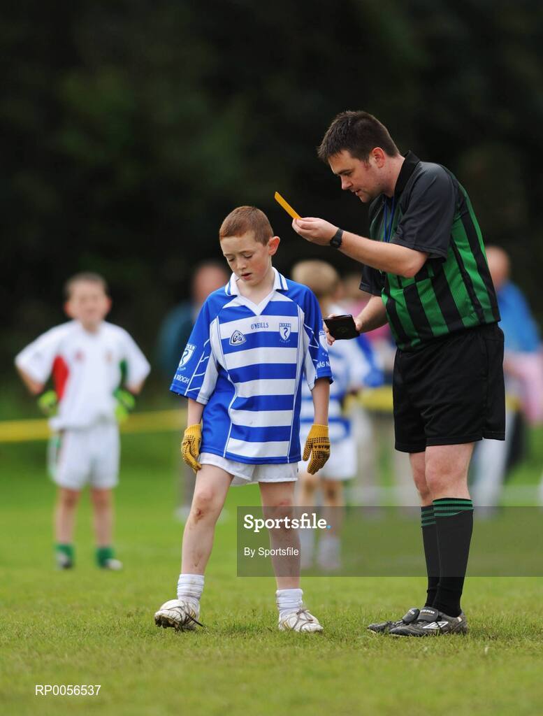 17 August 2008; The HSE Community Games National Finals kicked off in style this weekend as the Games celebrate 40 years of fun and achievement. Pictured at the HSE Community Games National Finals in Mosney is referee Jason O'Dwyer showing Sam Garvey, Naas West, Co. Kildare, the yellow card in the Mixed Under 10 Gaelic Football Final against Ternonmaccuirrt, Co. Tyrone. This years finals, which will take place from 16th - 17th August and 23rd - 24th August, will see an estimated 6,500 young people aged between six and 16 years participate in a diverse range of activities such as athletics, football, basketball, art, model making and dancing. Photo by Sportsfile