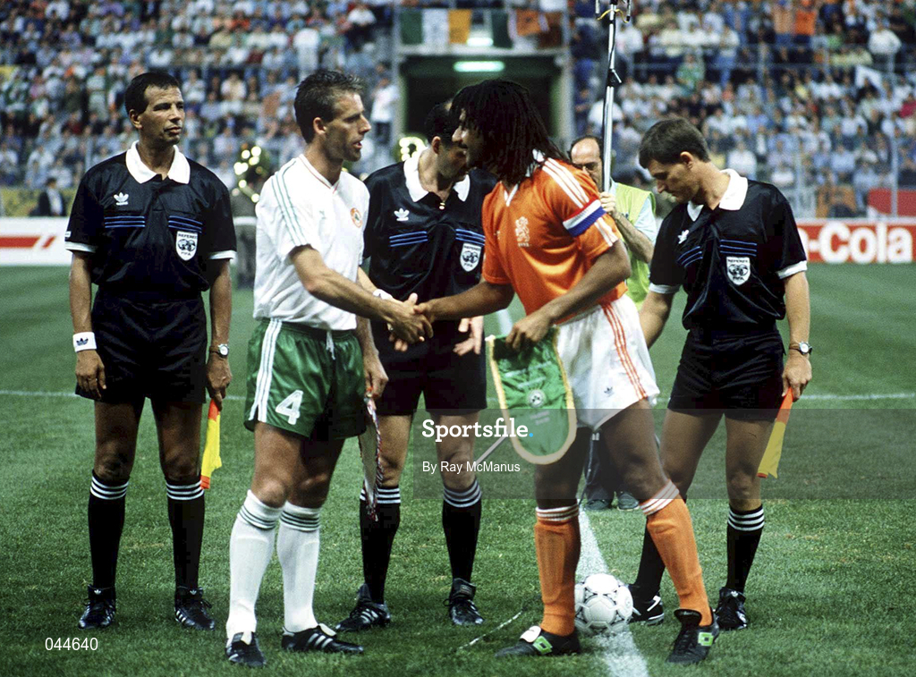 21 June 1990; Republic of Ireland captain Mick McCarthy shakes hands with Netherlands captain Ruud Ruud Gullit ahead of the FIFA World Cup 1990 Group F match between Republic of Ireland and Netherlands at Stadio La Favorita in Palermo, Italy. Photo by Ray McManus/Sportsfile