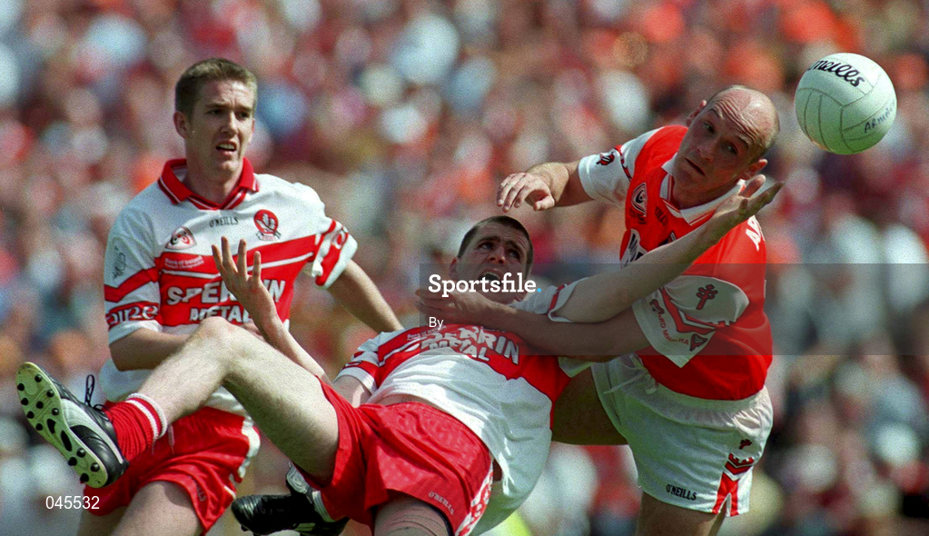 16 July 2000; Gerard Reid, Armagh, right, in action against Enda Muldoon, Derry, Ulster Football Championship Final, Armagh v Derry, Clones, Co. Monaghan. Picture credit; Damien Eagers/SPORTSFILE