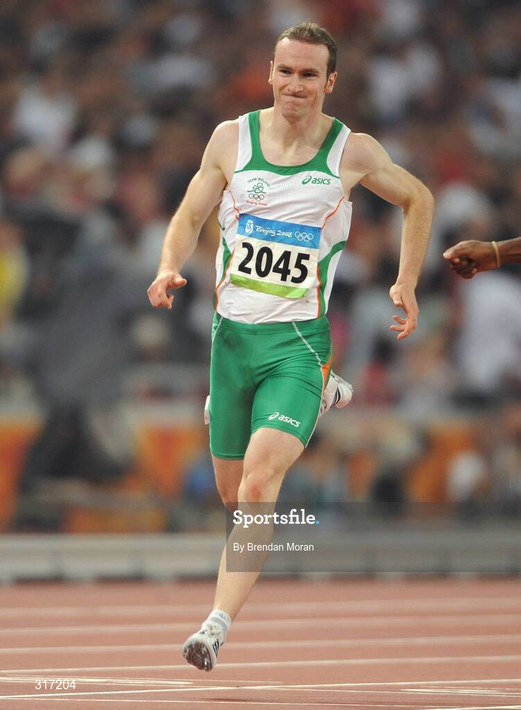 19 August 2008; Paul Hession, Ireland, reacts after crossing the line in semi-final of the Men's 200m, in which he finished 5th in a time of 20.38 seconds and 10th overall. The first 8 made the final. Beijing 2008 - Games of the XXIX Olympiad, National Stadium, Olympic Green, Beijing, China. Picture credit: Brendan Moran / SPORTSFILE