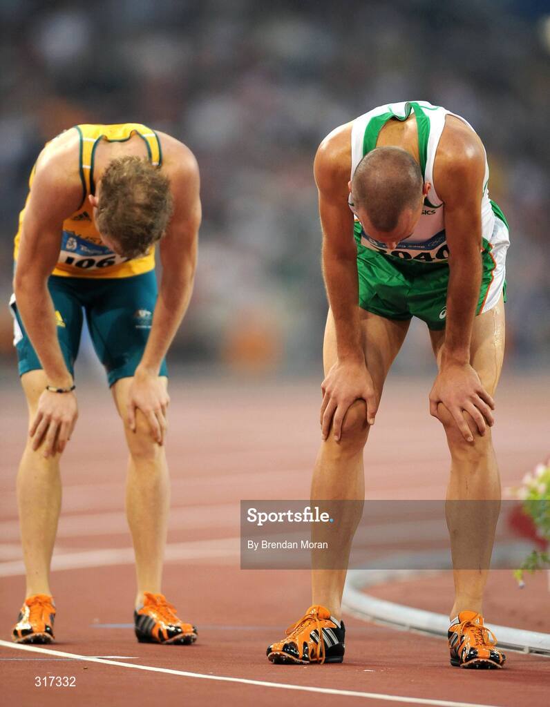 20 August 2008; Thomas Chamney, right, Ireland, catches his breath alongside Lachlan Renshaw, of Australia, after their heat of the men's 1500m, where Chamney finished 5th in a time of 1.47.66. Beijing 2008 - Games of the XXIX Olympiad, National Stadium, Olympic Green, Beijing, China. Picture credit: Brendan Moran / SPORTSFILE