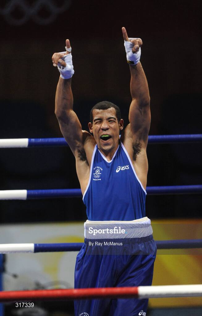 20 August 2008; Darren Sutherland, Ireland, celebrates victory over Alfonso Blanco Parra, from Venezuela, during a quarter-final bout of the Middle weight, 75kg, contest. Beijing 2008 - Games of the XXIX Olympiad, Beijing Workers Gymnasium, Olympic Green, Beijing, China. Picture credit: Ray McManus / SPORTSFILE