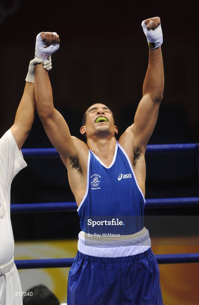 20 August 2008; Darren Sutherland, Ireland, celebrates victory over Alfonso Blanco Parra, from Venezuela, during a quarter-final bout of the Middle weight, 75kg, contest. Beijing 2008 - Games of the XXIX Olympiad, Beijing Workers Gymnasium, Olympic Green, Beijing, China. Picture credit: Ray McManus / SPORTSFILE