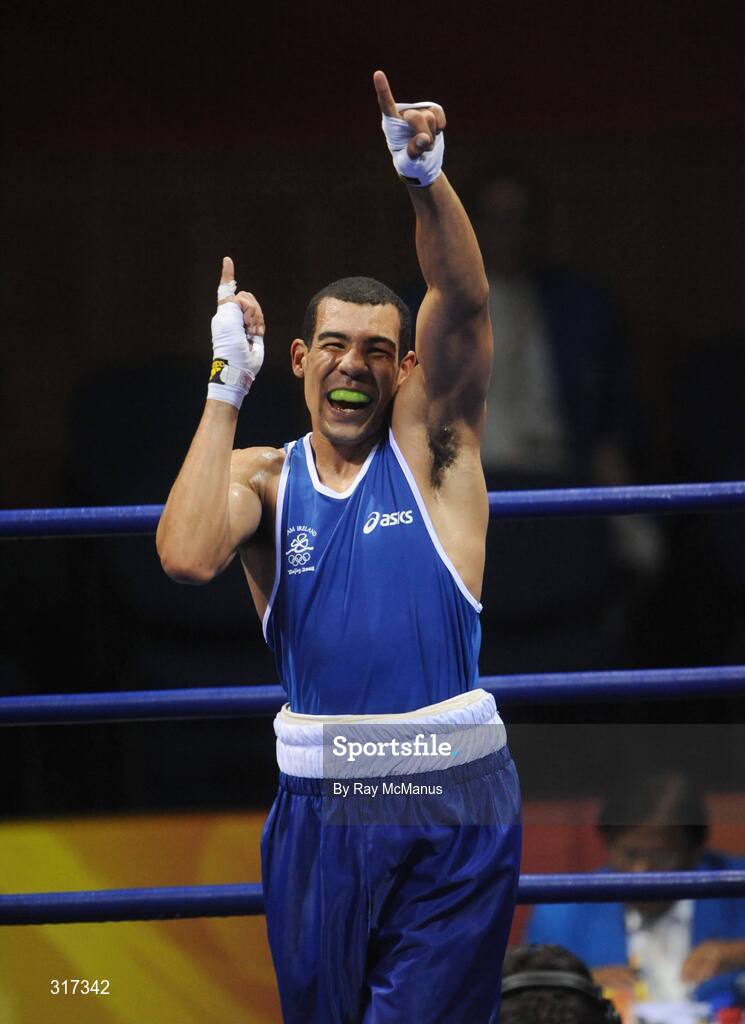 20 August 2008; Darren Sutherland, Ireland, celebrates victory over Alfonso Blanco Parra, from Venezuela, during a quarter-final bout of the Middle weight, 75kg, contest. Beijing 2008 - Games of the XXIX Olympiad, Beijing Workers Gymnasium, Olympic Green, Beijing, China. Picture credit: Ray McManus / SPORTSFILE
