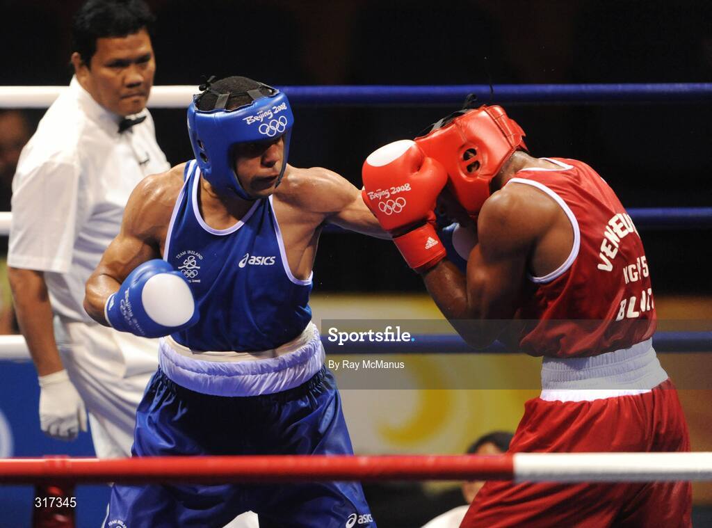 20 August 2008; Darren Sutherland, Ireland, in action against Alfonso Blanco Parra, in red from Venezuela, during their quarter-final bout of the Middle weight, 75kg, contest. Beijing 2008 - Games of the XXIX Olympiad, Beijing Workers Gymnasium, Olympic Green, Beijing, China. Picture credit: Ray McManus / SPORTSFILE